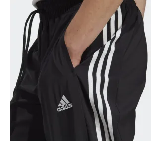 Pantalon adidas à chevilles élastiques et 3 bandes AEROREADY Essentials