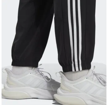 Pantalon adidas à chevilles élastiques et 3 bandes AEROREADY Essentials